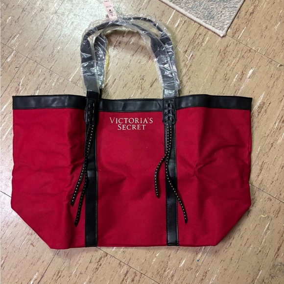 Victoria's Secret Handbags - Victoria's Secret Red Tote with Black Trim and Stud Accents NWT